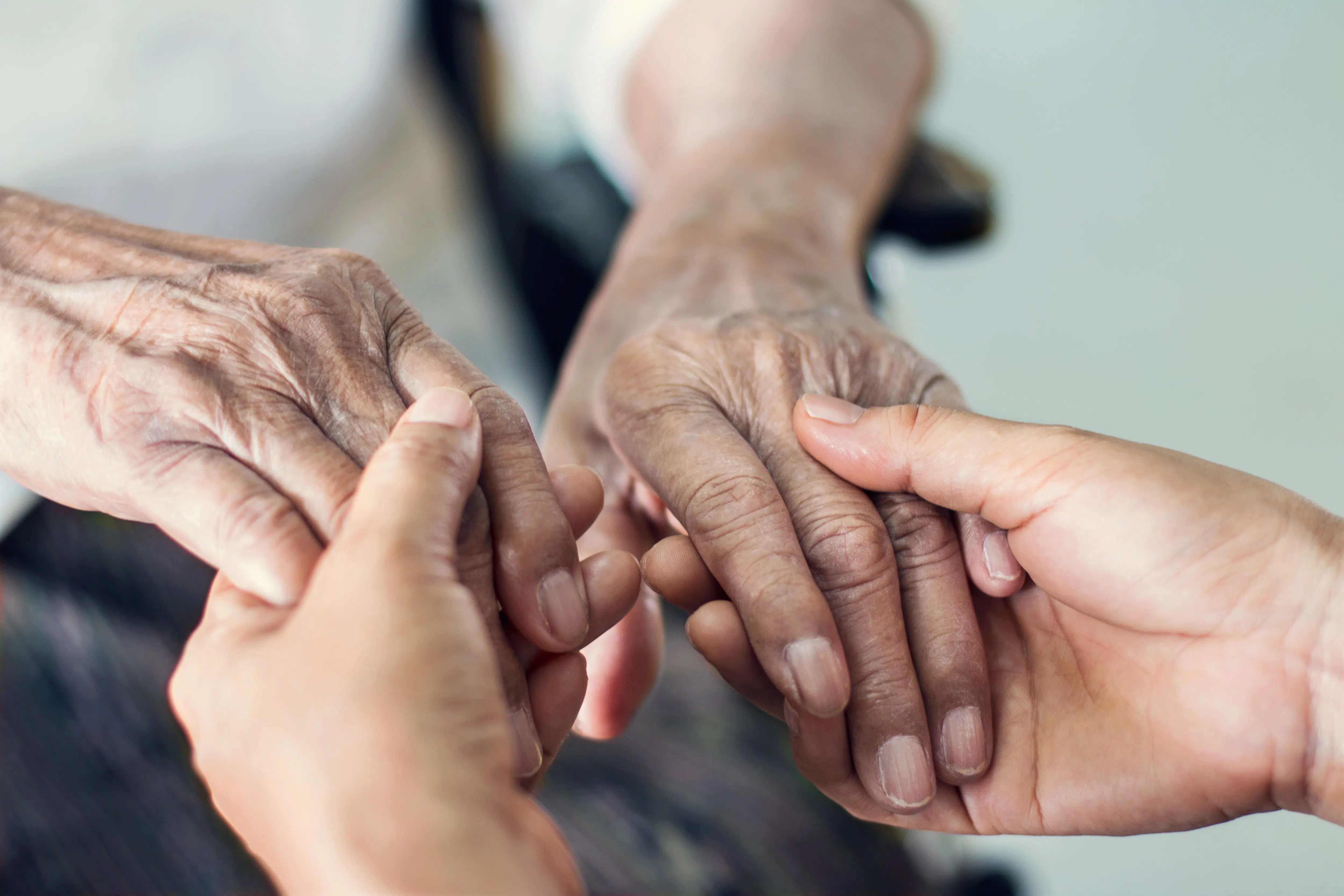 Close up hands of helping hands