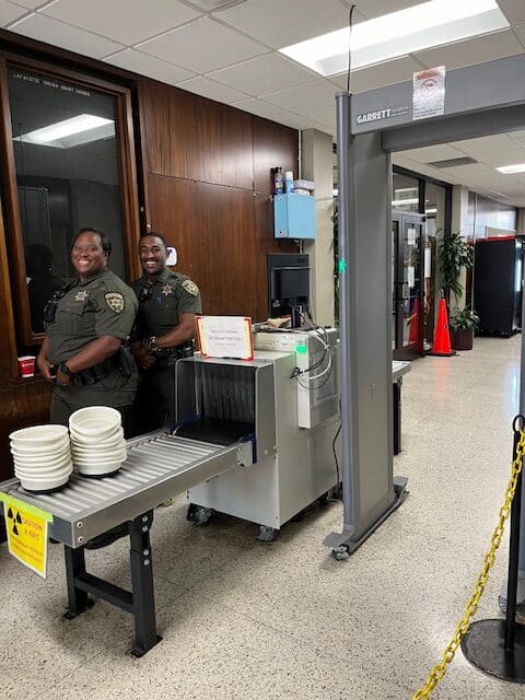Bailiffs With Scanner